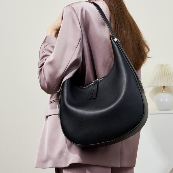 Bolso de cuero popular, nuevo y versátil, bolso de hombro tipo mensajero para uso diario, diseño moderno, bolso de piel de vaca para la axila.