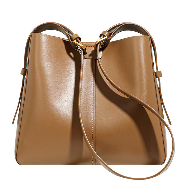 Bolso de mujer versátil para ir al trabajo, bolso de hombro informal de cuero, nuevo y popular bolso de cubo de cuero suave, bolso de moda