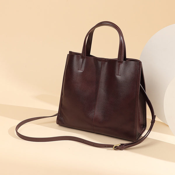 Bolsos de cuero para mujer, populares bolsos cuadrados verticales de gran capacidad para otoño e invierno, bolsos cruzados sencillos de un solo hombro, bolsos de mujer de piel de vaca de primera capa