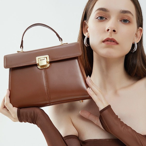 Nuevo bolso de mano premium texturizado, bandolera de un solo hombro con hebilla de herradura, bolso Kelly de piel para uso diario.