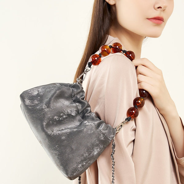 Nuevo bolso de nube de estilo chino, popular, nuevo y versátil, bolso de mujer portátil, bolso de cuero plisado, bolso de mensajero